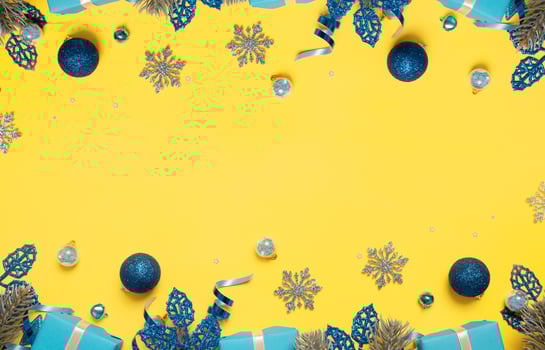 Christmas background with pine tree, gifts and festive decorations top view. Christmas flat lay. Copy space photo