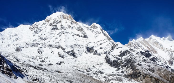 View of the Nepalese mountains at sunrise. Mountain winter landscape photo