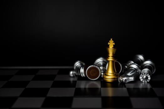 Strategy and business planning ideas. Chess gold on the board. photo