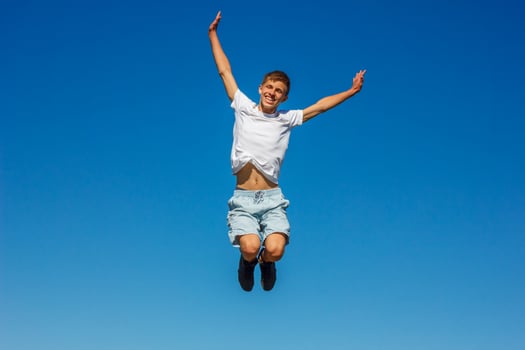 happy boy jumping in the photo