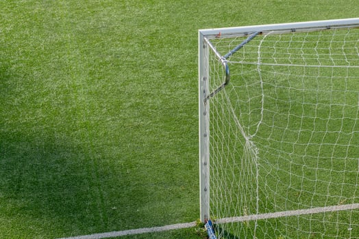 Synthetic grass soccer field photo