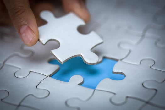 Hand of woman connecting jigsaw puzzle, Business solutions, success and strategy, Business partnership concept. photo