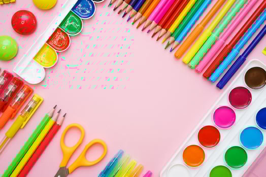 School supplies, colored pencils and watercolor paint pens, sticky notes photo