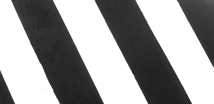 Black and white painted wall for background or wallpaper. Traffic line on floor or ground. photo