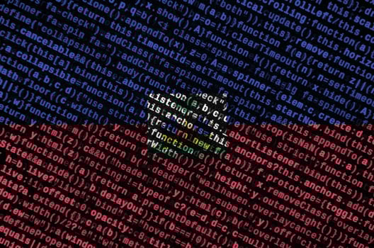 Haiti flag  is depicted on the screen with the program code. The concept of modern technology and site development photo