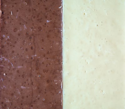 Dark and white chocolate. Chocolate background. Contrast of chocolate bars. photo