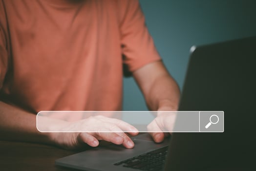 Data Search Technology , Engine Optimization. Man's hands using a laptop computer to searching for information, job, business, shopping online by Search Console on the website. photo