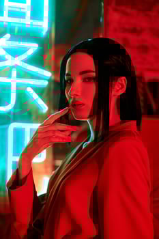 Anime woman in a red suit with short hair cut, black hair. The killer girl in the red jacket. Beauty portrait photo