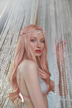 Beautiful elf woman in underwear, long pink hair. Beauty portrait, romantic look retro style photo