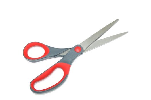 Red scissors isolated on a white background photo