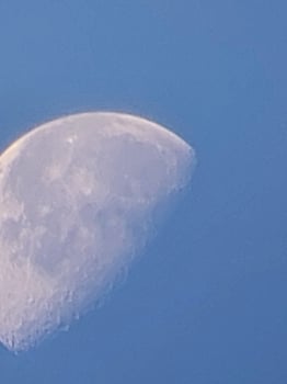 Morning moon in the blue sky photo