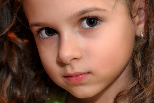 Potrait of curly hair little girl photo