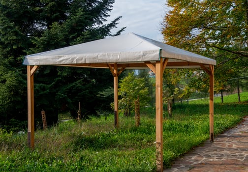 Wooden gazebo with cover photo