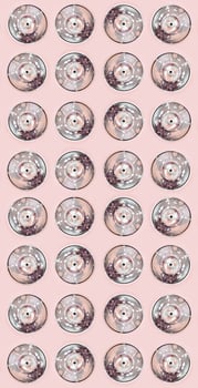 Many used spray cans for graffiti drawing lies on a pastel colored backgroung. Street art painting concept. Minimal flat lay pattern. Top view photo
