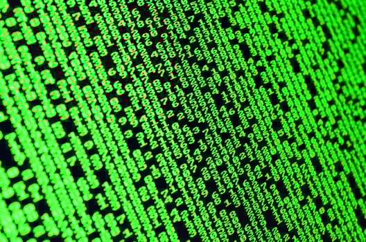 Macro of password selection on the monitor of the office computer. The concept of hacking the protection of a personal data keeper. The stream of supposed digital passwords of four and five digits photo