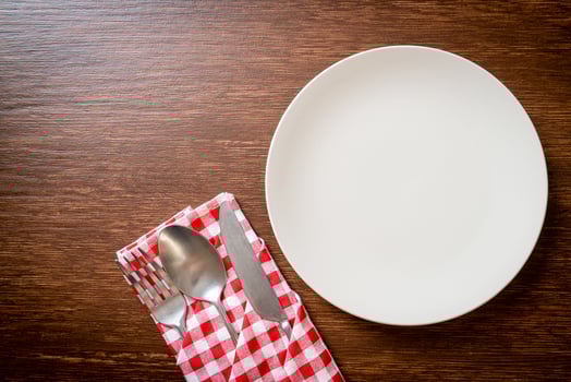 empty plate or dish with knife, fork and spoon photo