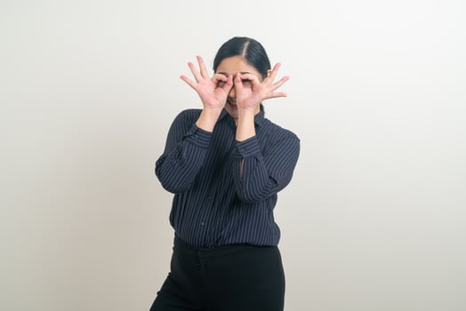 Asian woman with ok hand sign photo