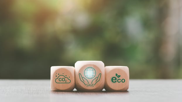wooden blocks on table natural background,concept protecting environment alternative energy Sustainable renewable energy sources Green energy innovation and environmentally friendly energy technology photo