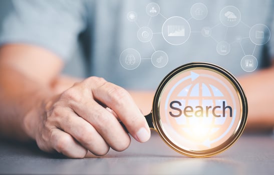 search technology Search Engine Optimization,Using Search Console on Your Website,Connecting and Searching Big Data Worldwide via Keywords.businessman holding magnifying glass and showing virtual icon photo