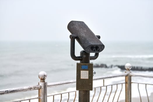 Coin-operated binocular viewer looking out to sea photo