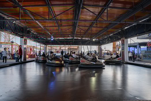 Electric bumper cars or dodgem cars at amusement park in Brighton photo