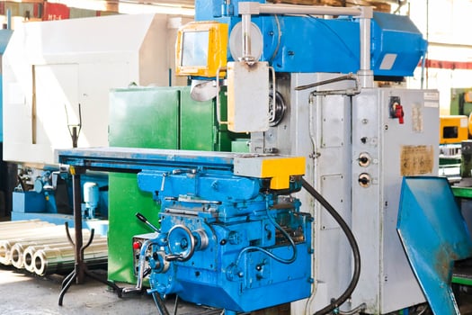 Industrial iron lathe for cutting, turning of billets from metals, wood and other materials, turning, manufacturing of details and spare parts at the factory photo