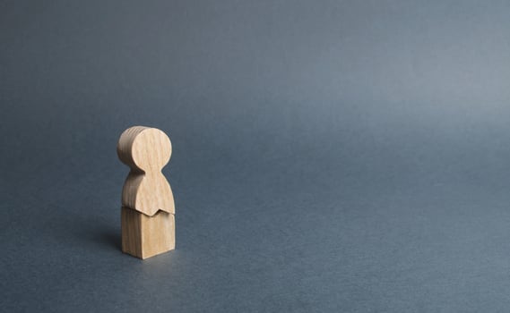 A wooden figure of a man with a crack. concept of psychological stress and pressure. Could not stand our nerves and our health. Threat of life. Injury and death. Never give up. Internal contradictions photo