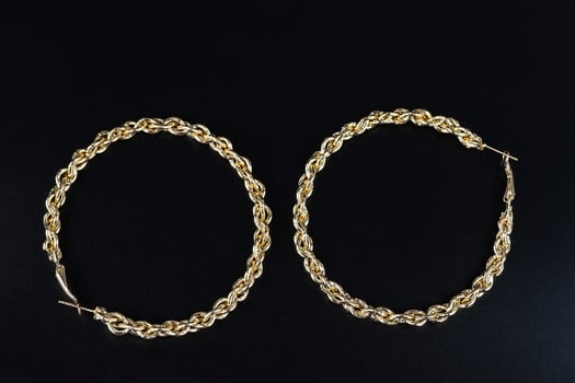 Jewelry earrings and costume jewelry on a black background photo