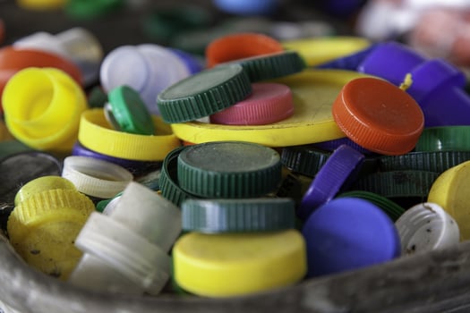 Dirty plastic caps photo