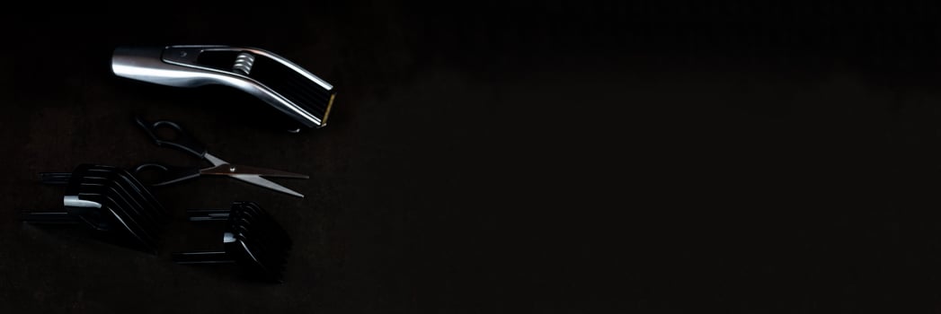hair clipper black background. photo
