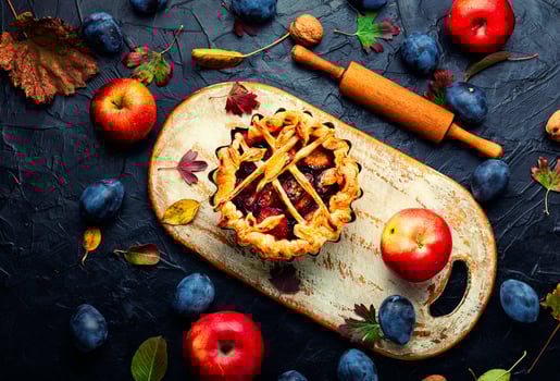 Autumn pies baked with fruits photo