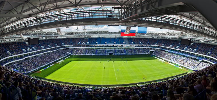 Soccer stadium arena with natural green grass photo