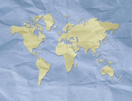 world map screen on recycled paper photo