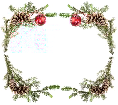 spruce tree twigs with cones and red balls photo