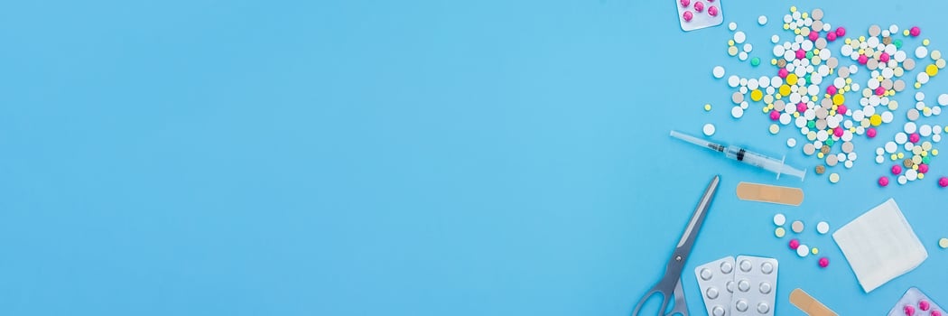 pills on a blue background photo