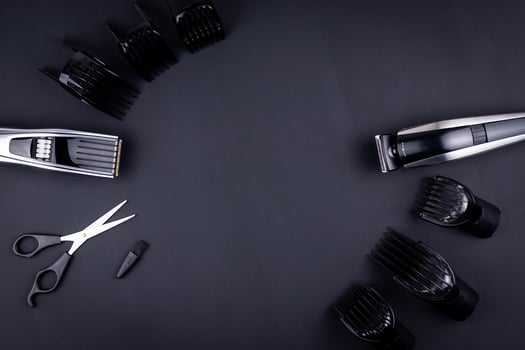 hair clipper black background photo