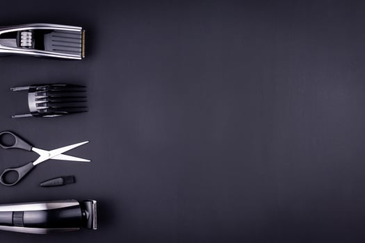 hair clipper black background photo