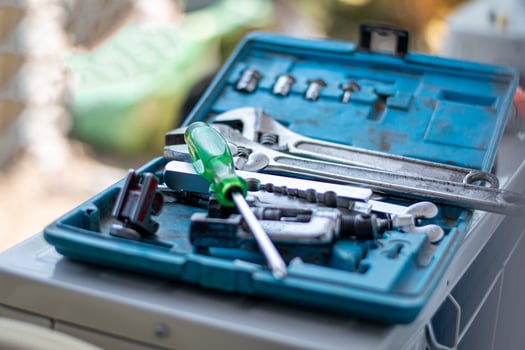 Closeup of the tool consists of screws, spanners, nuts and others in the box of an electrician. photo