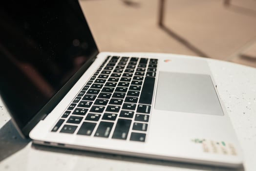 Close-up laptop keyboard outdoors. photo