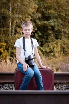 the boy with the camera photo