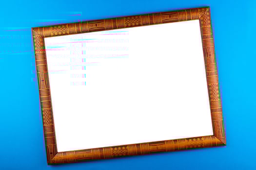 Wooden frame blue background photo