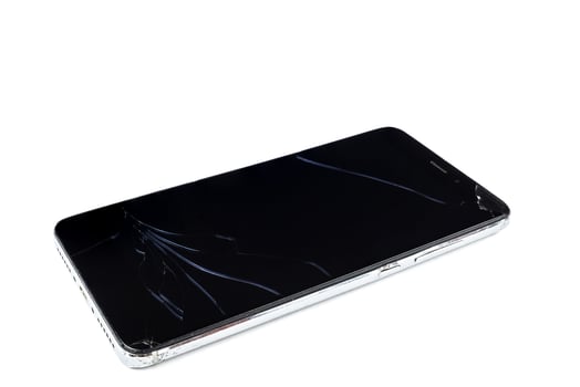 broken smartphone on white background photo