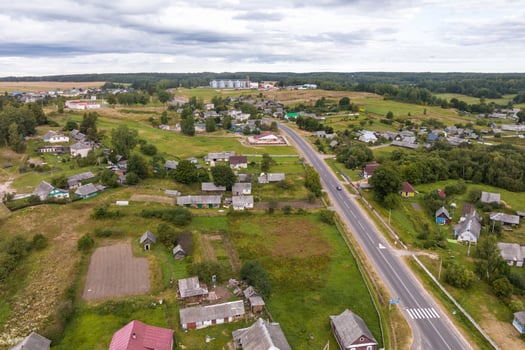 panoramic aerial view of private development with country houses or village photo