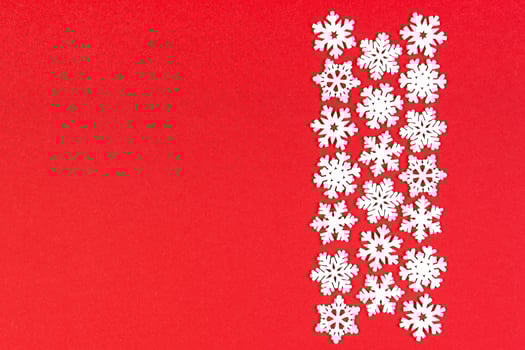Top view of winter ornament made of white snowflakes on colorful background. Happy New Year concept with copy space photo