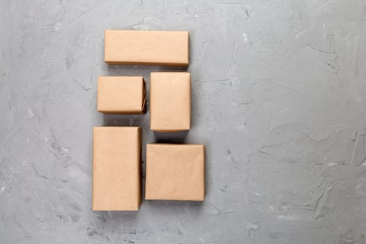 cardboard box on gray cement background, Brown mail package top view photo