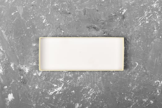 cardboard box on gray cement background surface. top view blank for you design photo