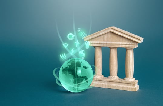 Government state building and globe with environmental symbols. Energy efficiency politics, autonomy, renewable resources economy. Investments in innovative technologies. Financing of green projects. photo