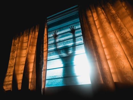 Slender man standing outside our window at night photo