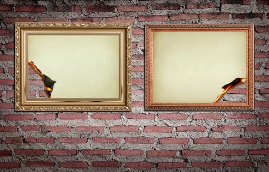 vintage gold frame with burned on wall  background photo