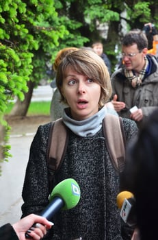 KHARKOV. UKRAINE - MAY 17, 2022 Participants of the first LGBT action in Kharkov give interviews about an unexpected attack and disruption of the event photo